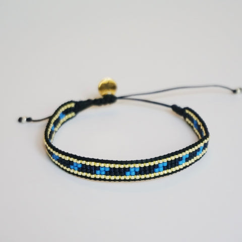 Pulsera Miyuki dorado / azules 4 líneas